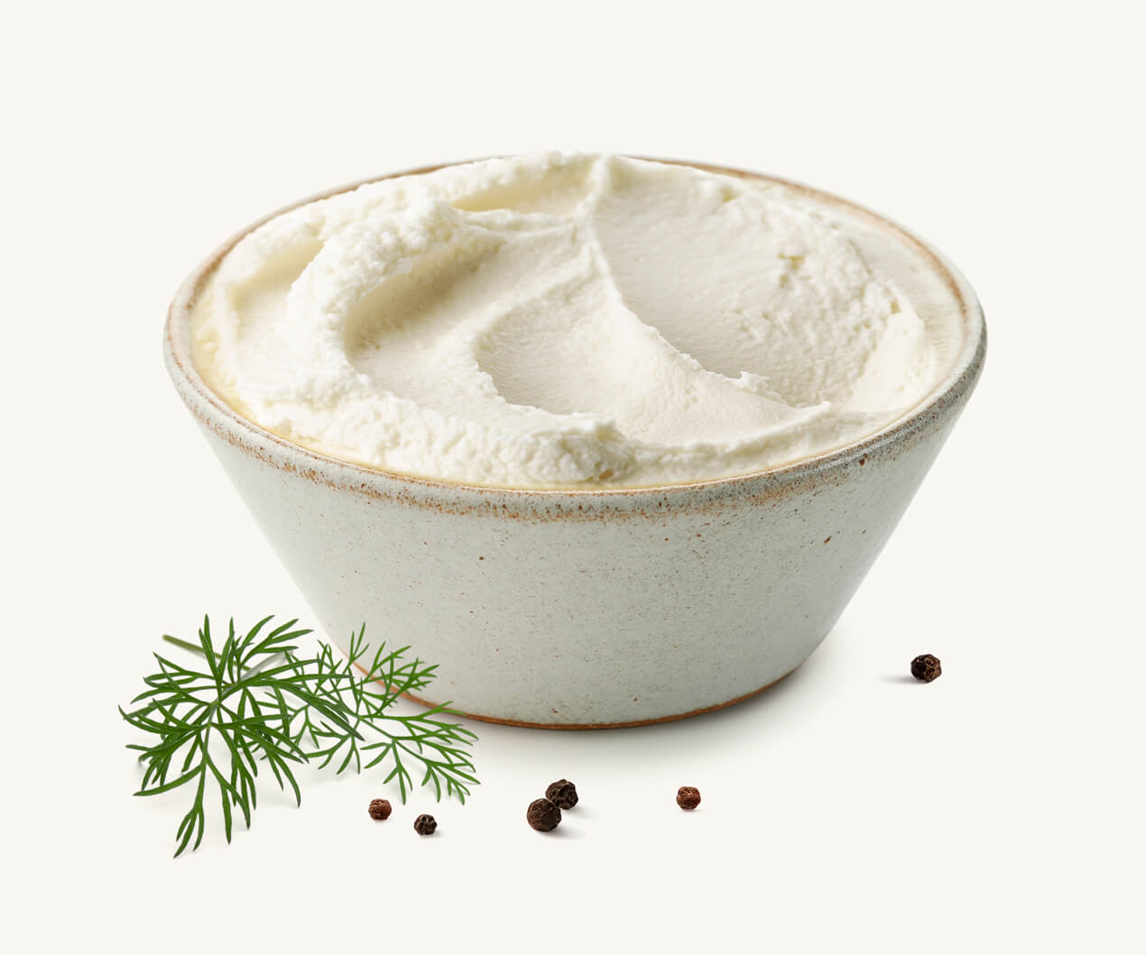 queso-crema-clasico-light Pote de queso crema light acompañado de ramita de eneldo y granos de pimienta